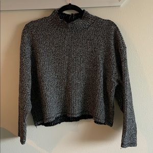 Cropped knitted Zara sweater.
